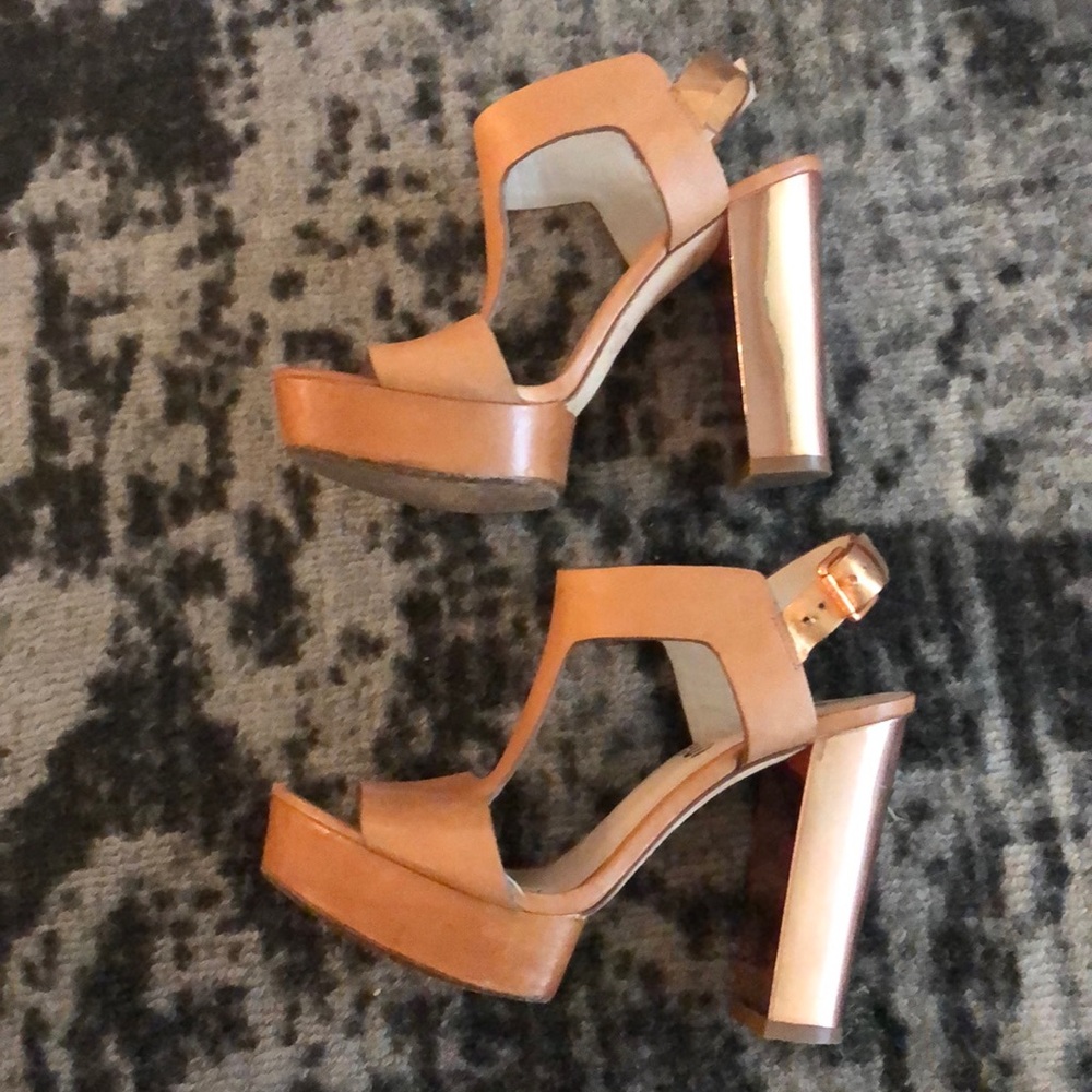 Rose gold and leather Michael Kors platform feel